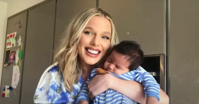 Helen Flanagan holding her new baby