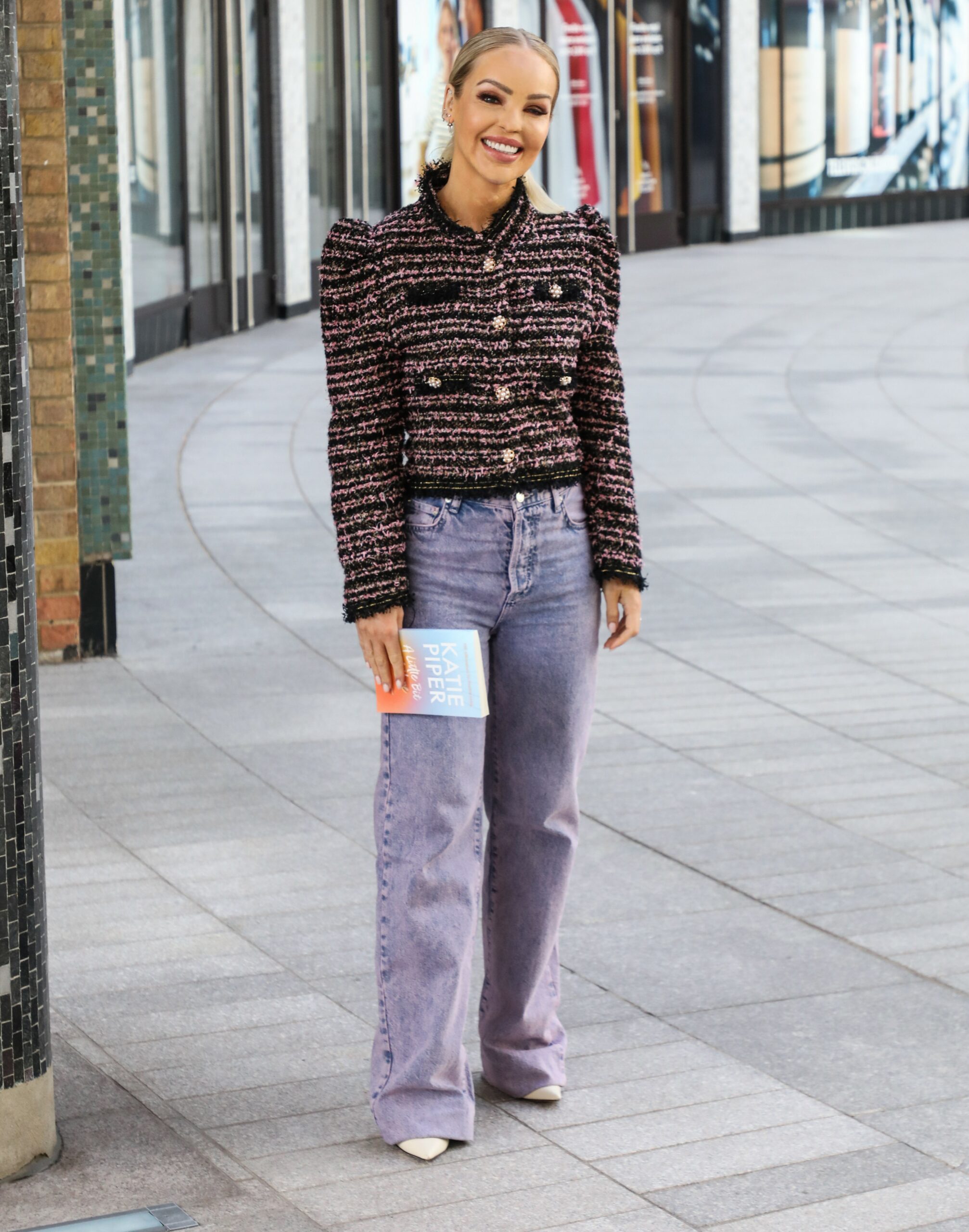 Katie Piper smiles outside TV studios