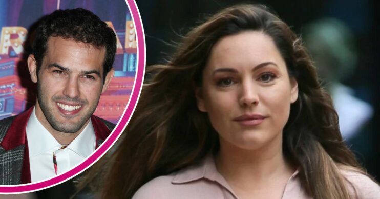 Jeremy Parisi smiles, Kelly Brook is impassive