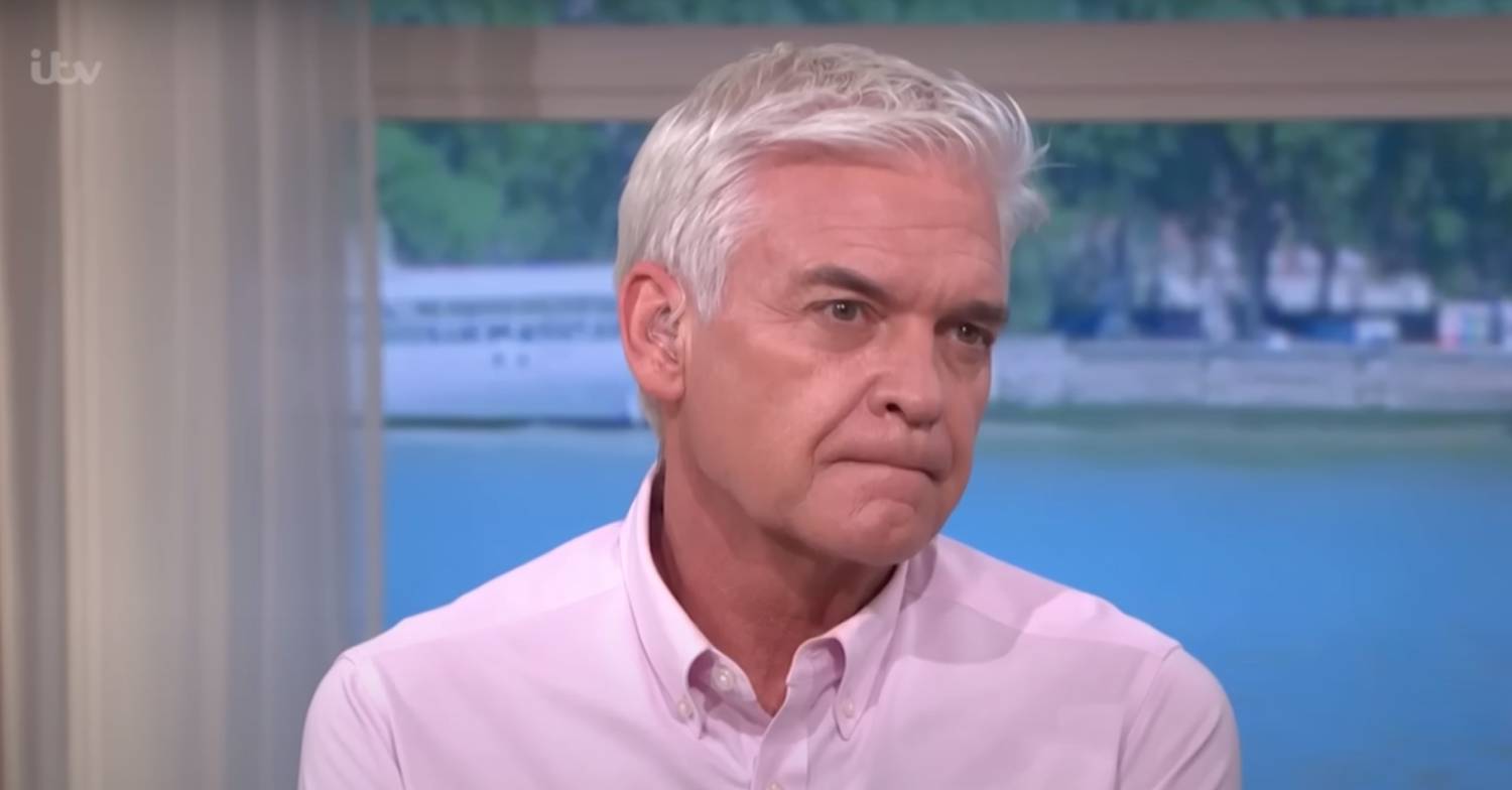 Phillip Schofield focuses on what he's listening to