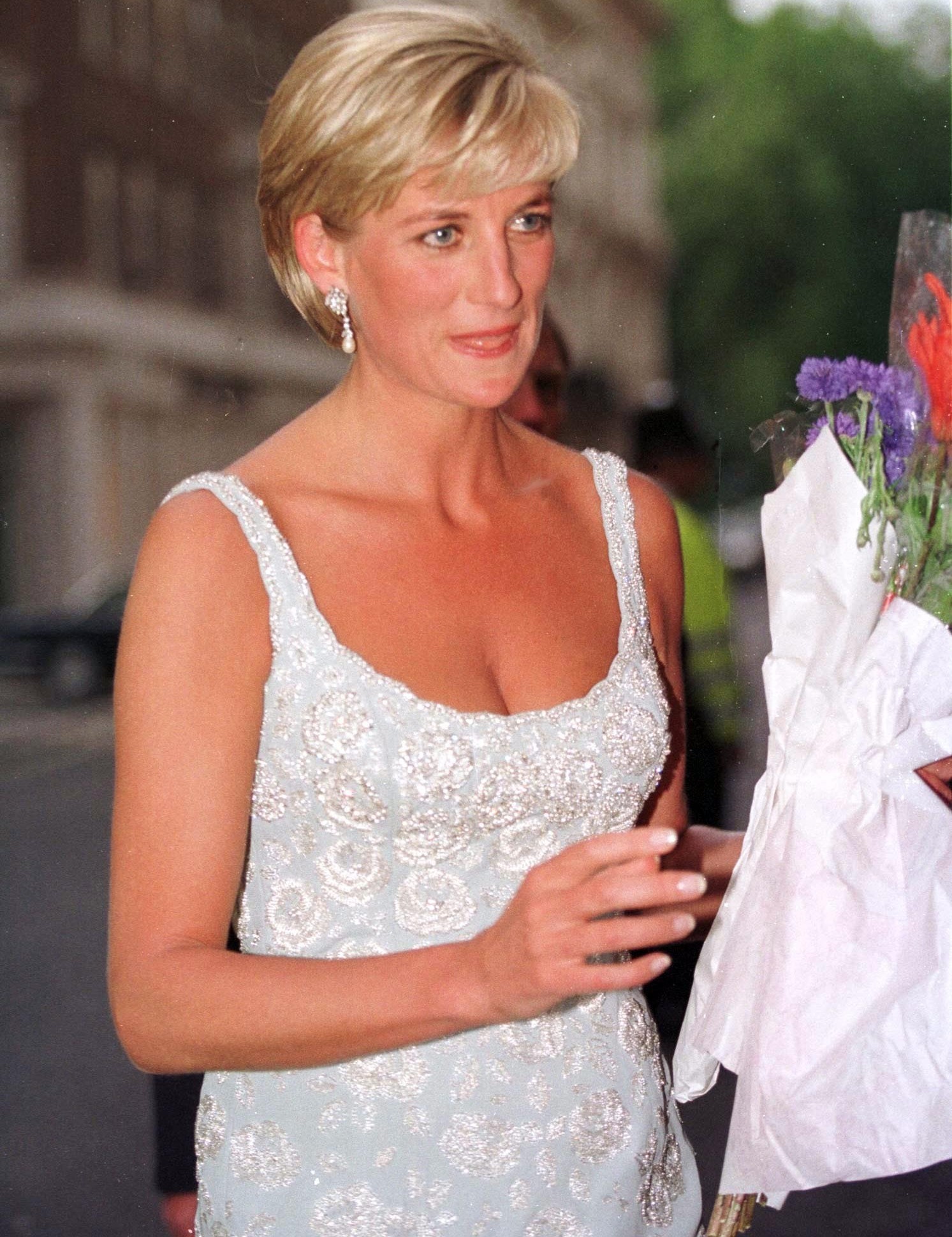 Princess Diana receiving flowers during royal engagement