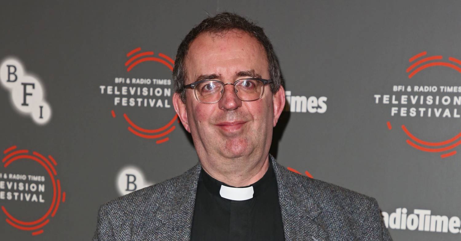 Reverend Richard Coles on a red carpet