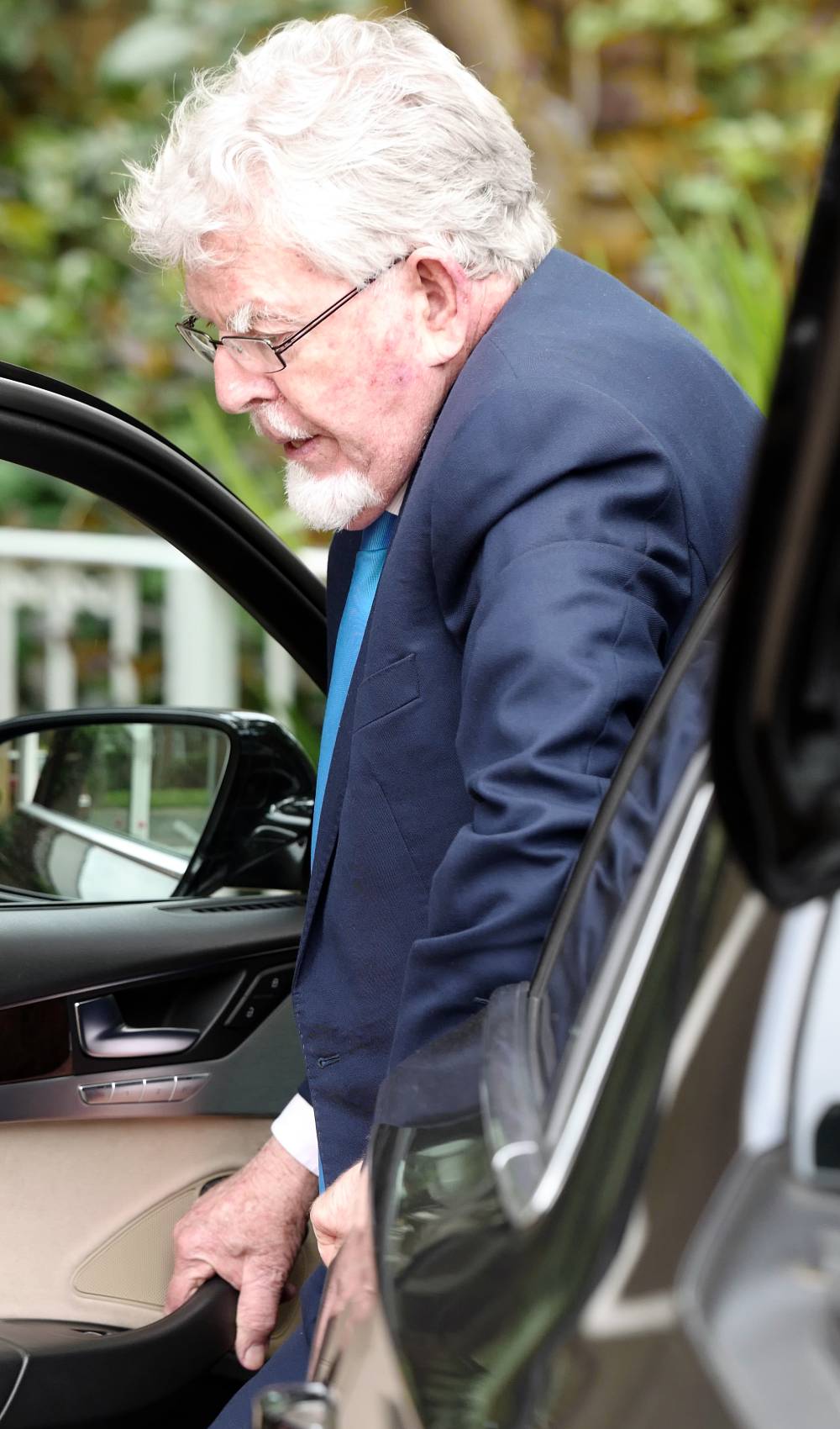 Rolf Harris arrives home after a jury failed to reach a verdict on indecent assault charges in May 2017