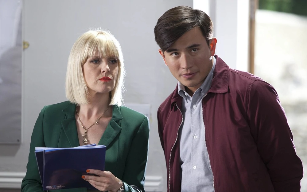 Ashley Jensen as Agatha (left) and Bill Wong (right) in Wellspring of Death