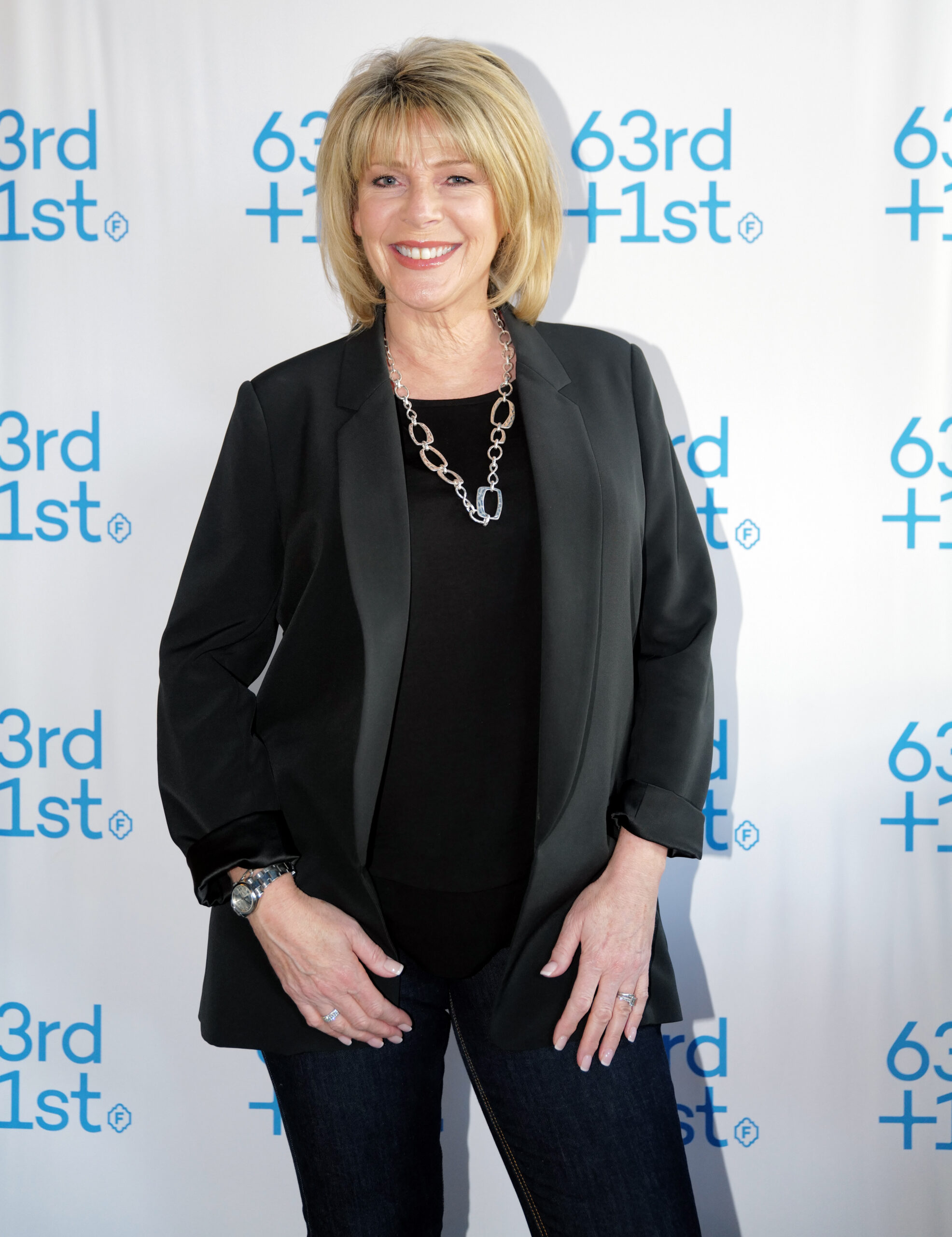 Ruth Langsford on the red carpet wearing a black suit