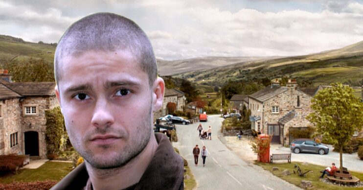 Scott Windsor in Emmerdale on a background of the Emmerdale village