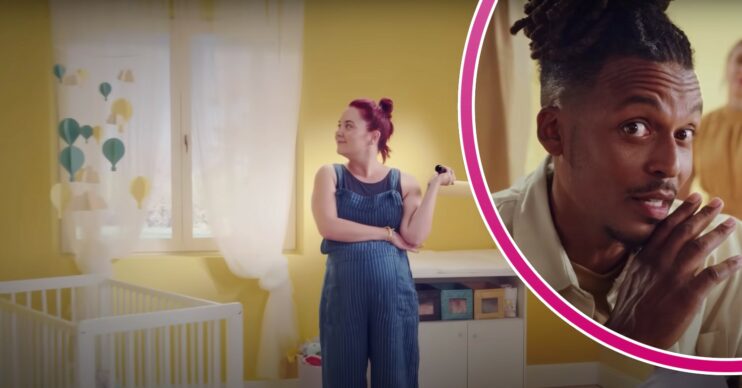 Hannah holding a paint roller and a singer whispering to the camera in the Crown Paints advert