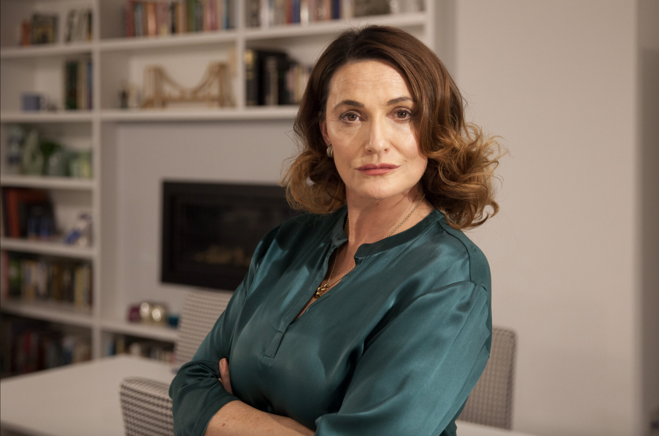Sarah Parish in green silk blouse as Mariel Ford in McDonald & Dodds