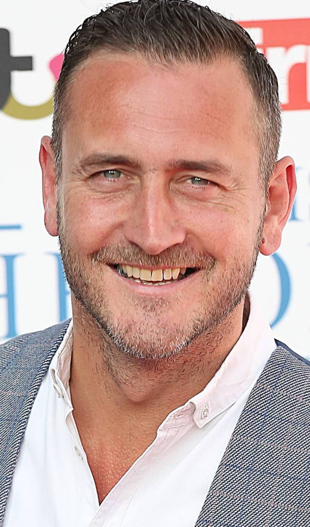 Strictly 2022 star Will Mellor poses for the cameras on a red carpet