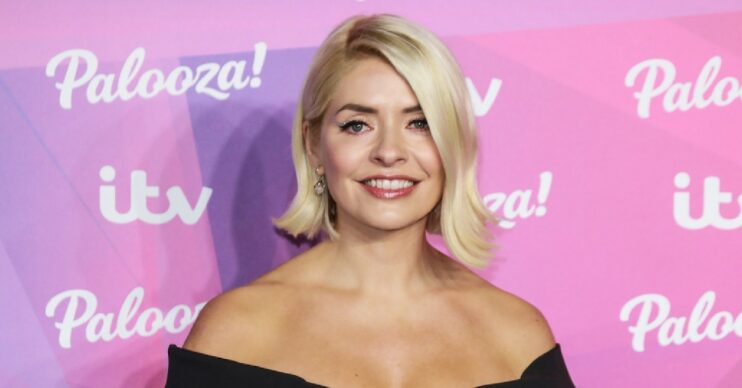 Holly Willoughby smiling on red carpet at ITV Palooza