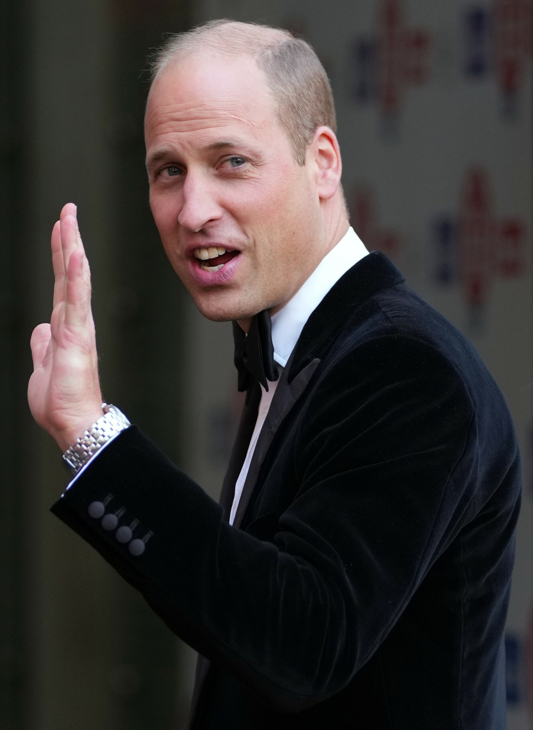 Prince William smiling and waving during The Sun's Who Cares Wins Awards