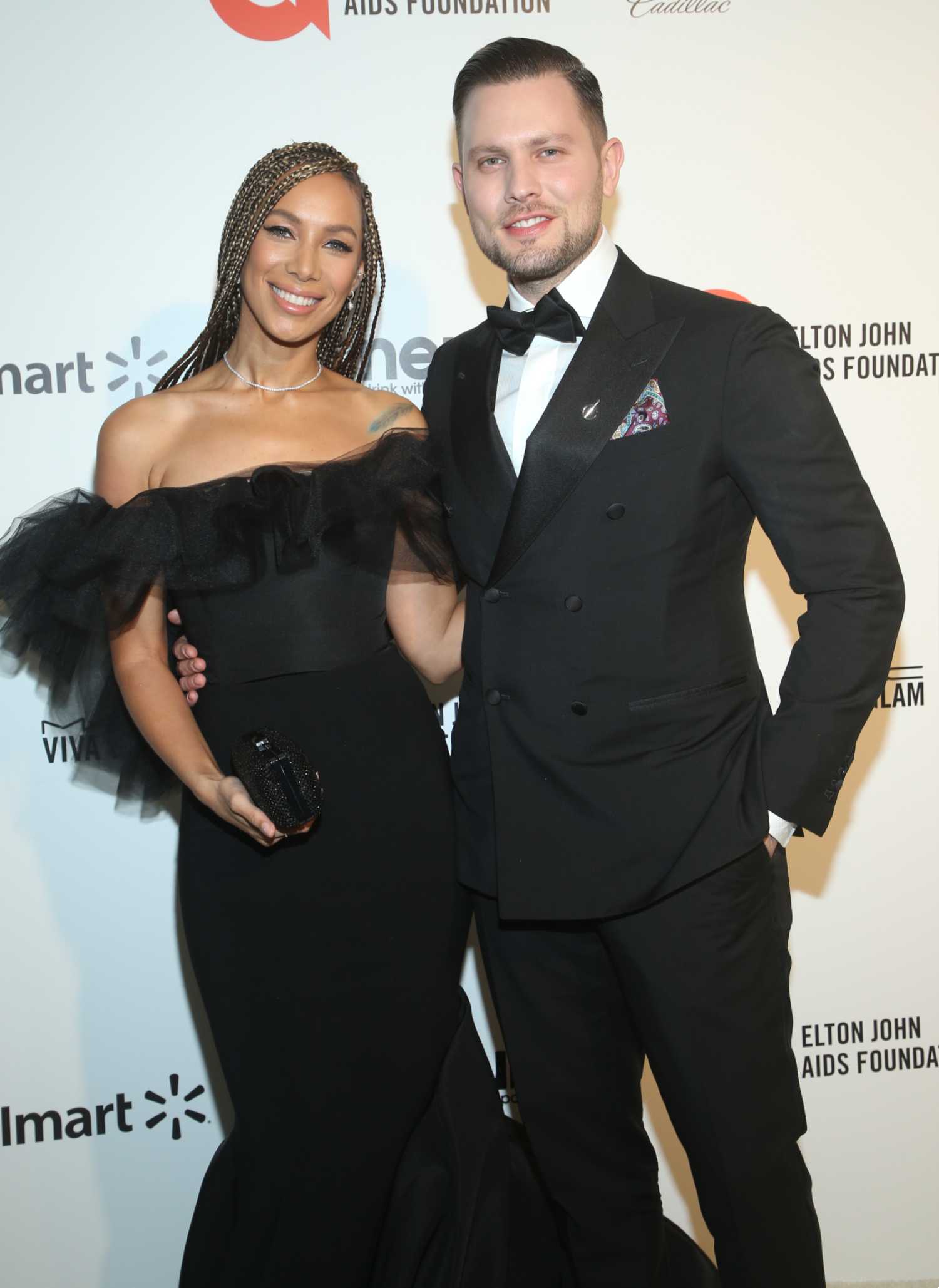 Leona Lewis and her husband Dennis Jauch smiling on the red carpet