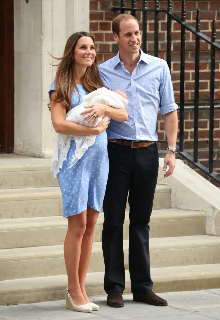Kate Middleton, Prince William and their son Prince George after his birth