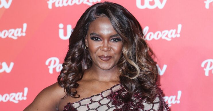 Oti Mabuse smiling on the red carpet at ITV Palooza
