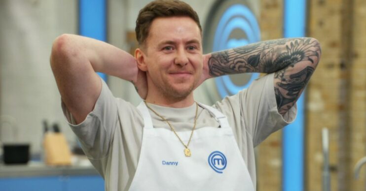 Danny Jones with his hands behind his head on Celebrity Masterchef 2022