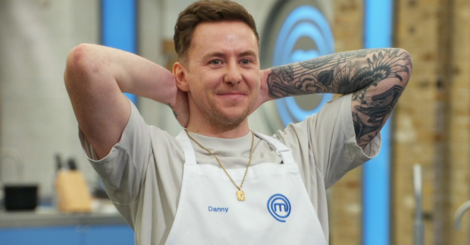 Danny Jones with his hands behind his head on Celebrity Masterchef 2022