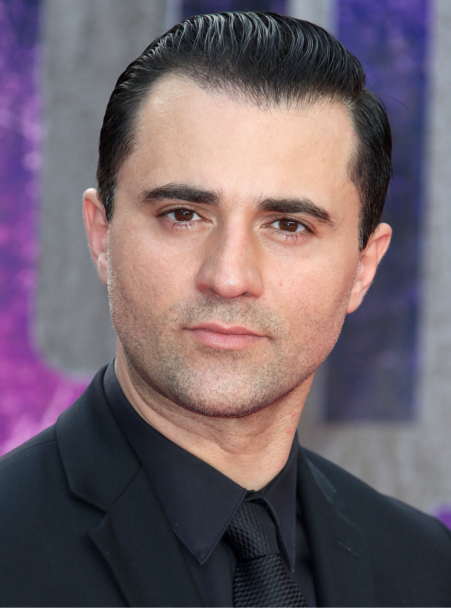 Pop Idol star Darius Danesh wearing a suit on the red carpet
