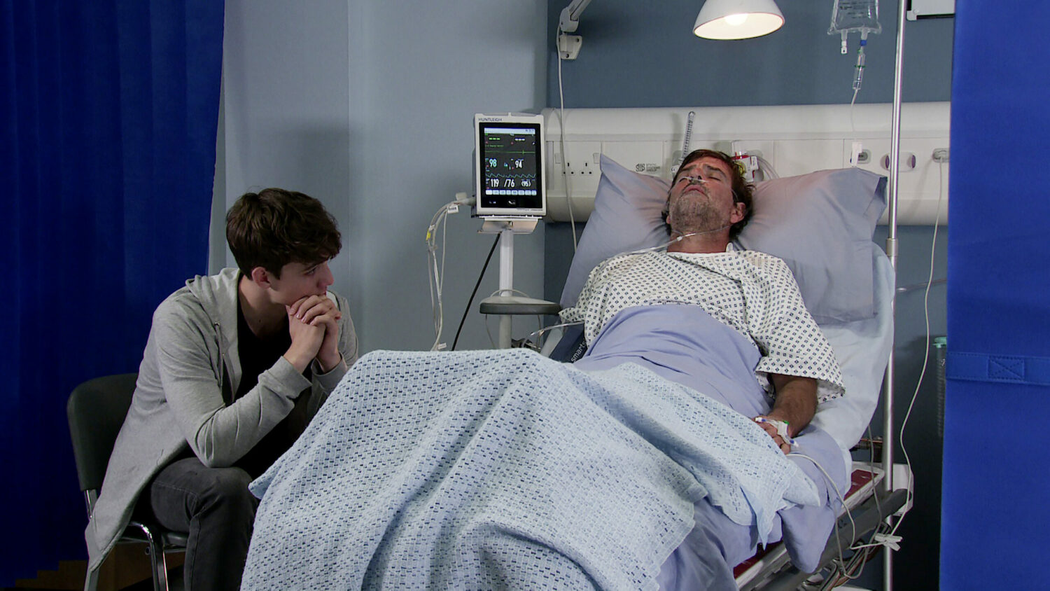 Coronation Street Aaron by his dad's hospital bed side