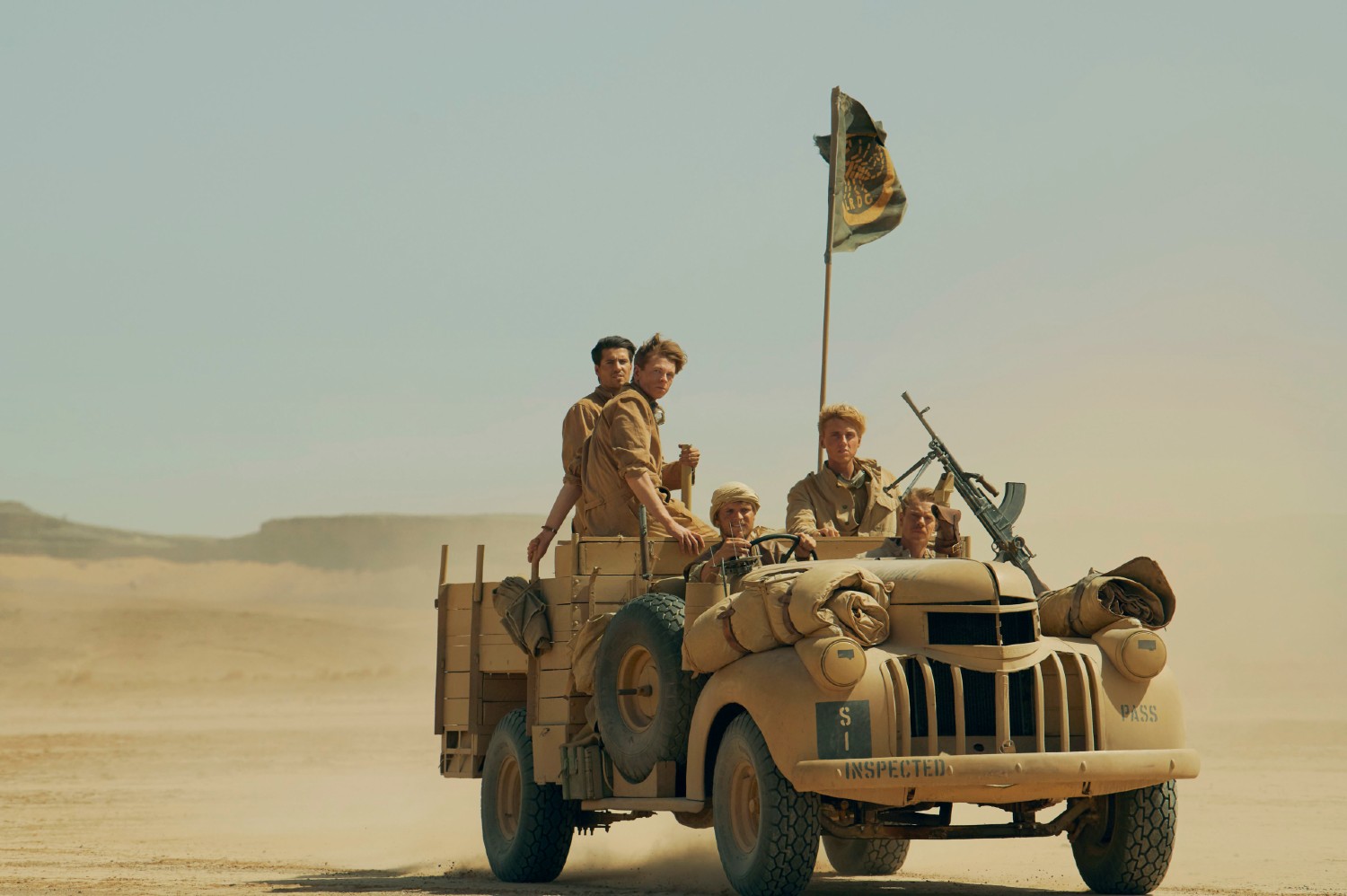 SAS Rogue Heroes cast in an army truck