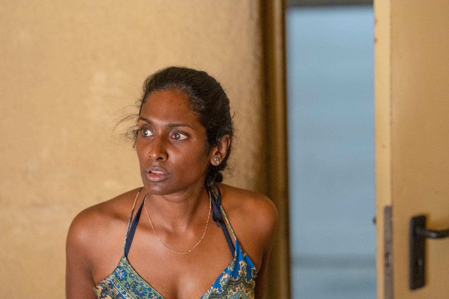 Annieka Rose looking afraid in Crossfire