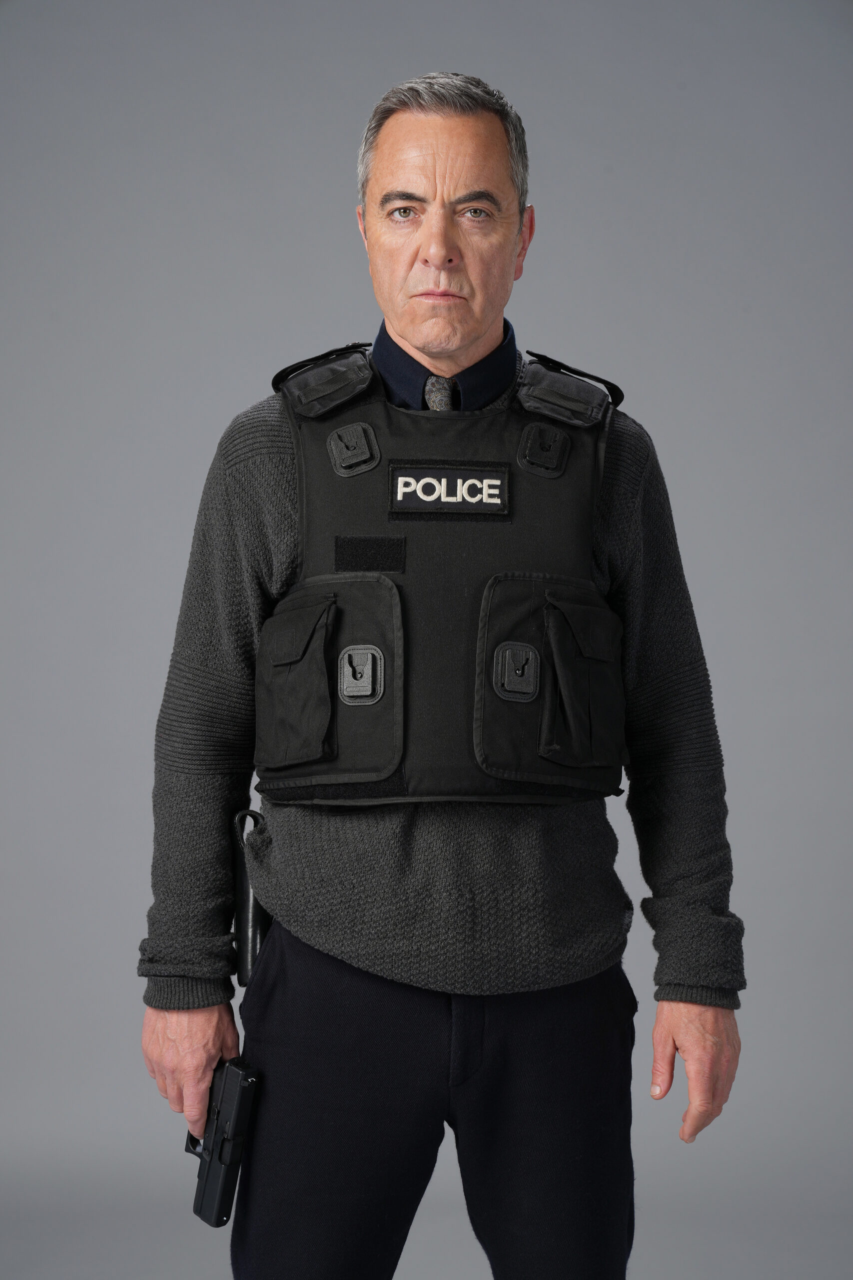 Bloodlands,Character Portraits,Tom Brannick (JAMES NESBITT) He stands in his police uniform with a stressed facial expression