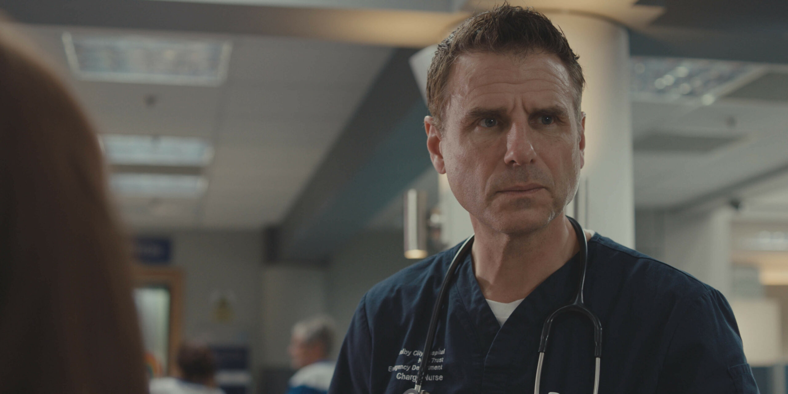 Casualty David looking concerned