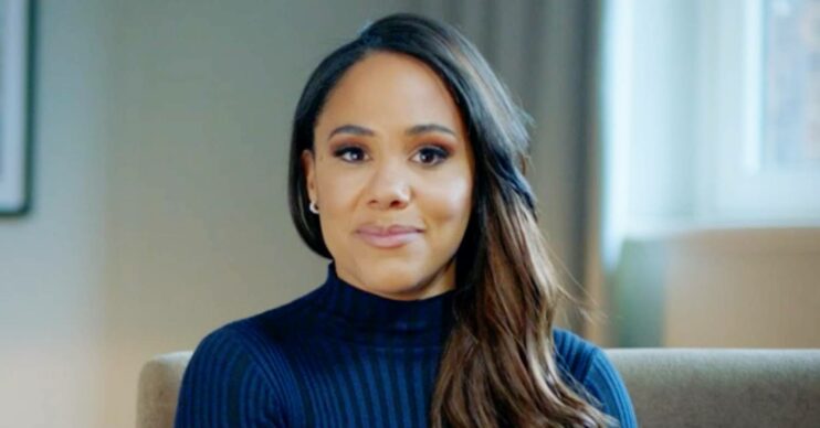 Alex Scott smiles