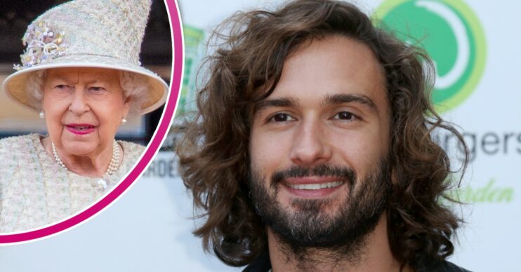 The Queen in cream outfit and Joe Wicks smiling at event