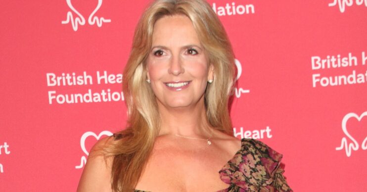 Police officer Penny Lancaster on the red carpet smiling