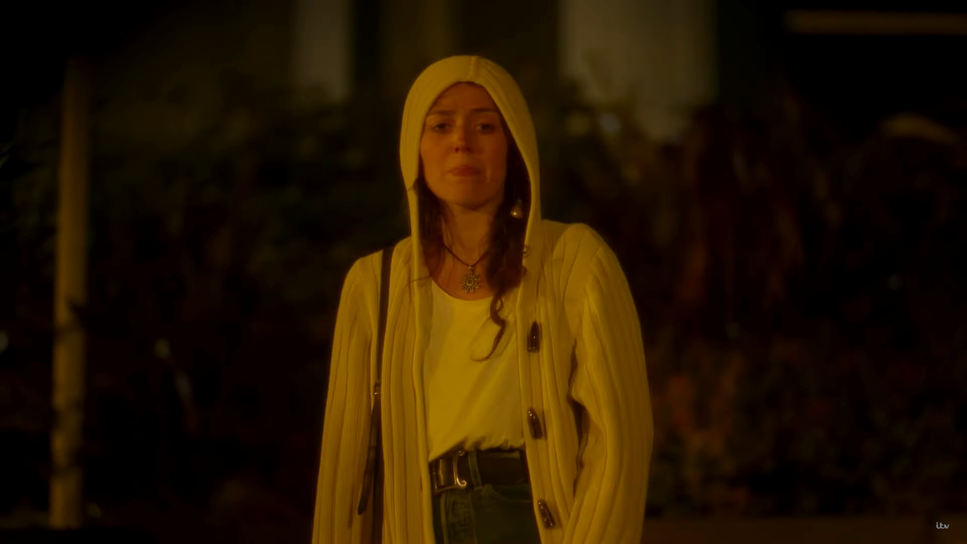 Anna Russell-Martin as Rosie Duff, she looks upset in a yellow coat