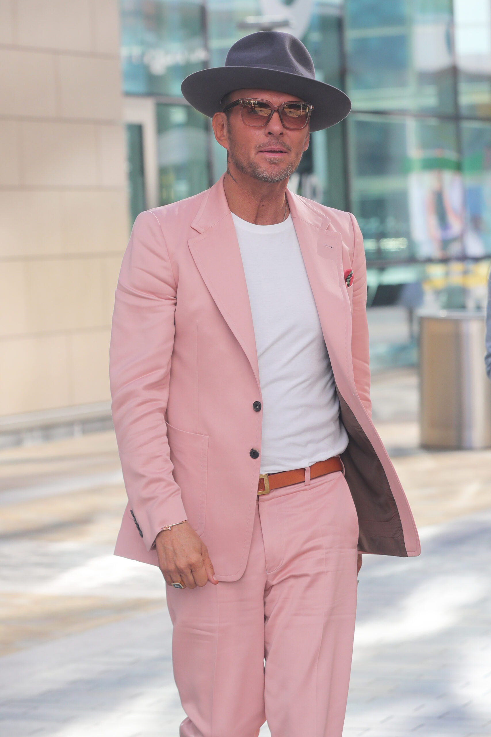 Matt Goss in pink suit, sunglasses and hat
