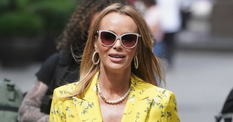 Amanda Holden in yellow blazer and sunglasses