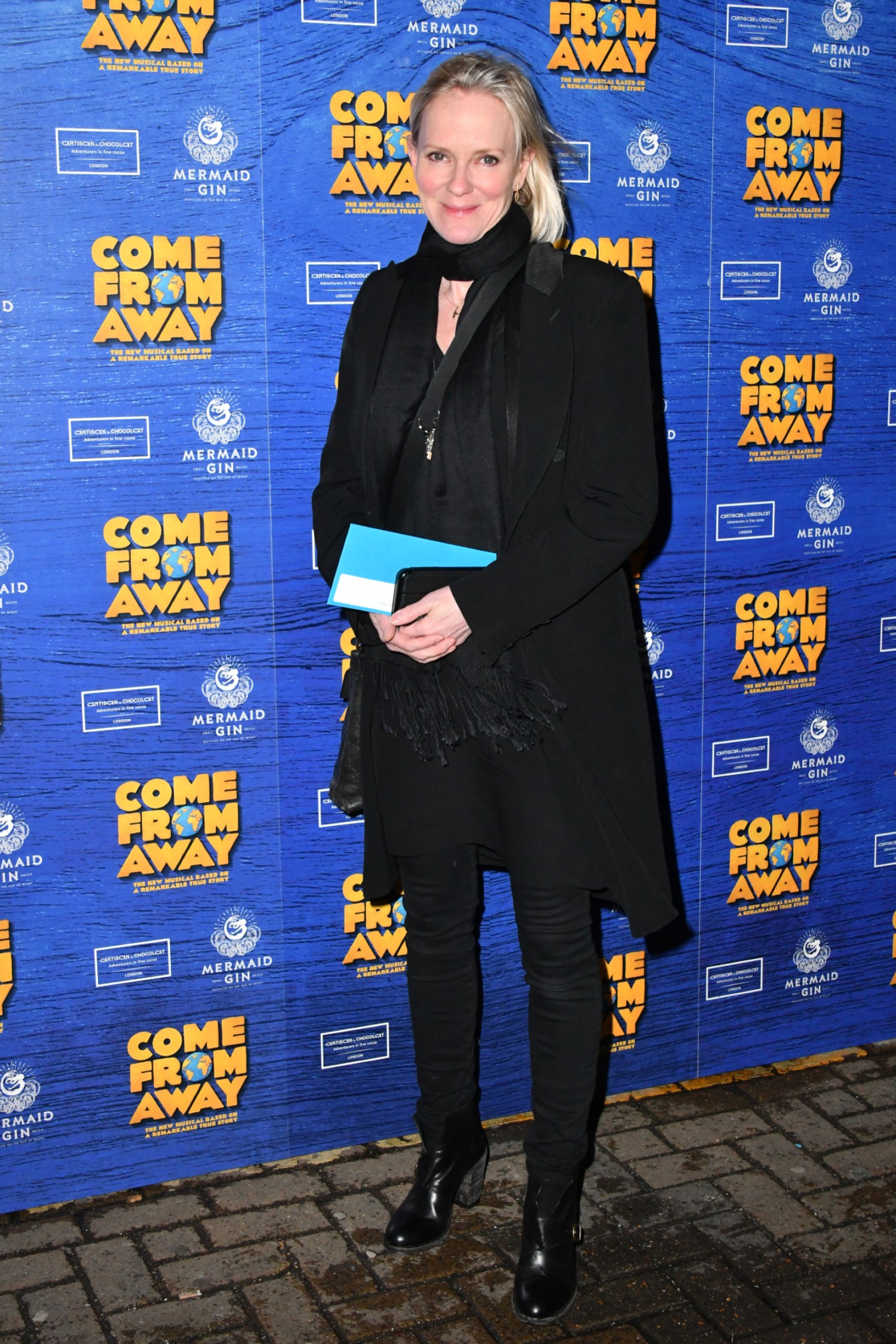Hermione Norris wearing a black dress on the red carpet