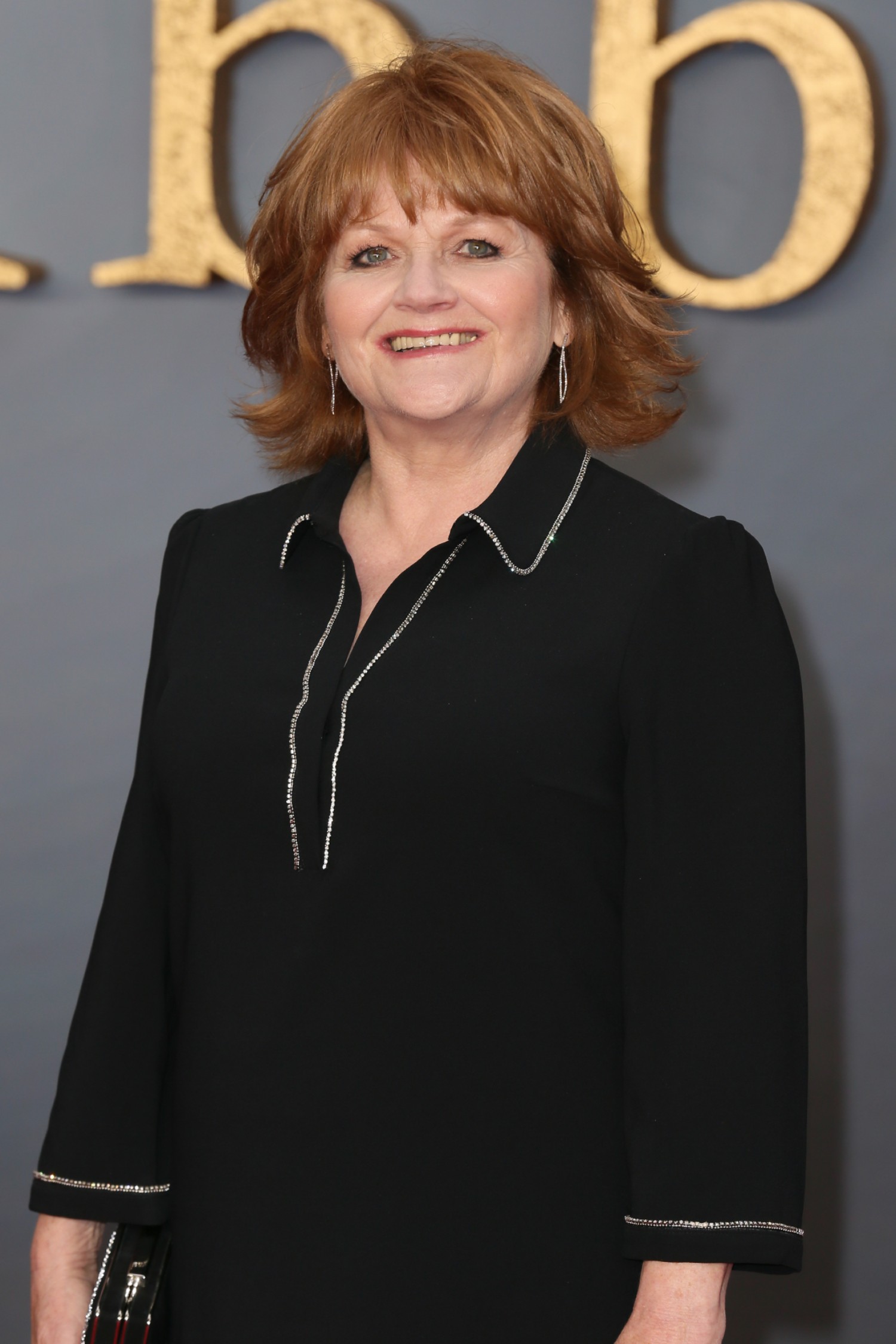 Lesley Nicol wearing a black dress on the red carpet
