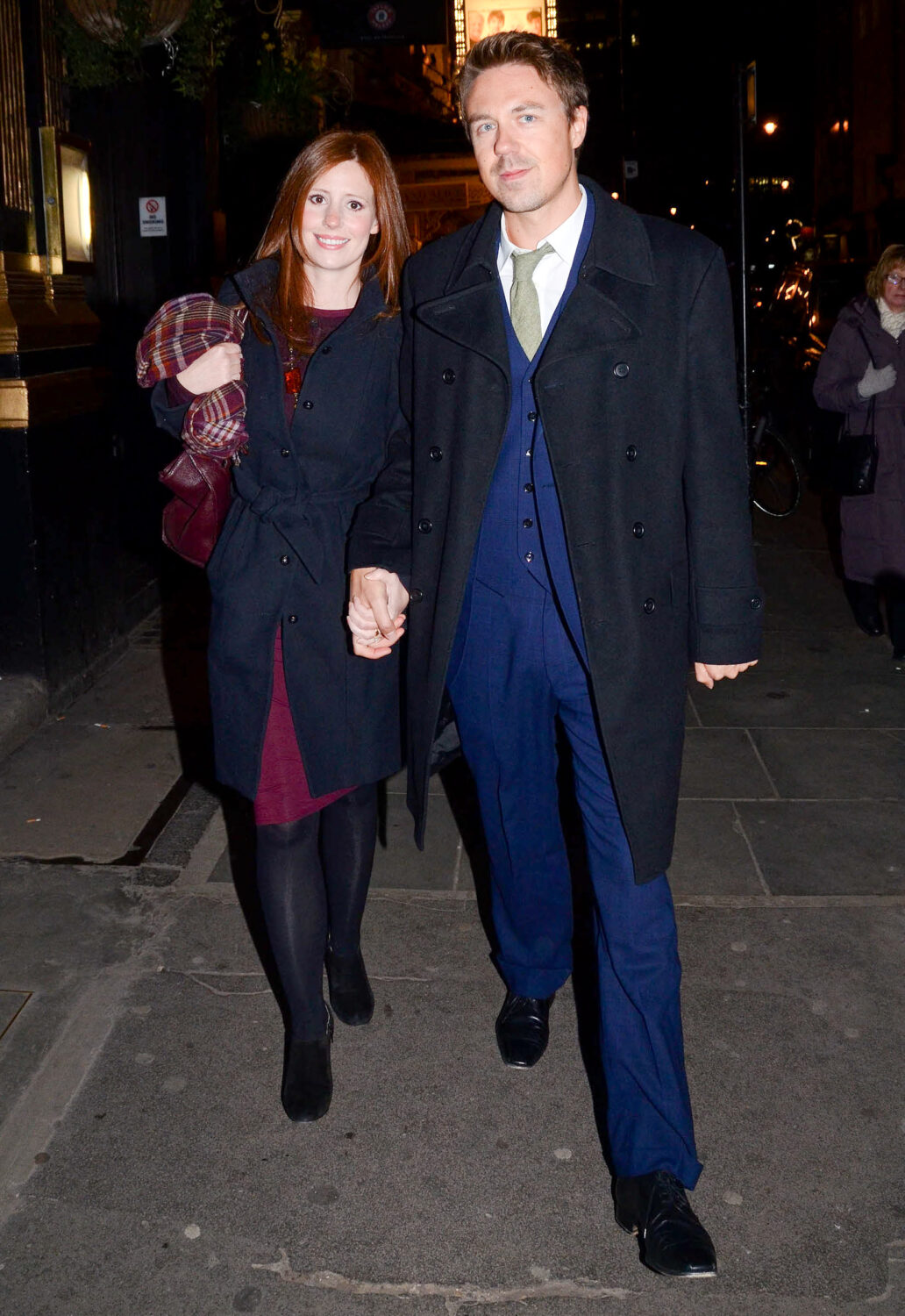 Amy Nuttall and husband Andrew Buchan hold hands as they're papped on a night out 