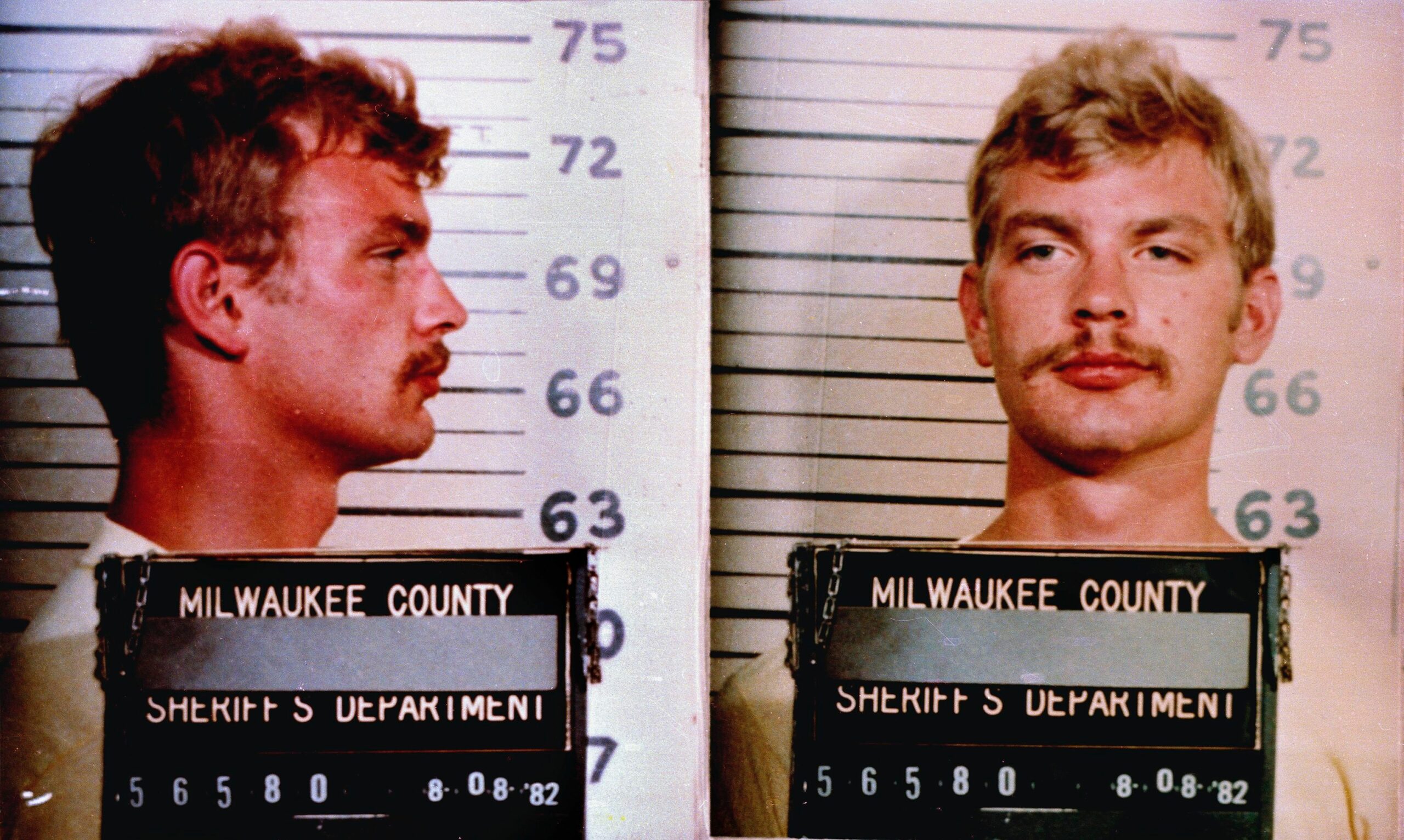 Jeffrey Dahmer with a moustache in his police mugshot