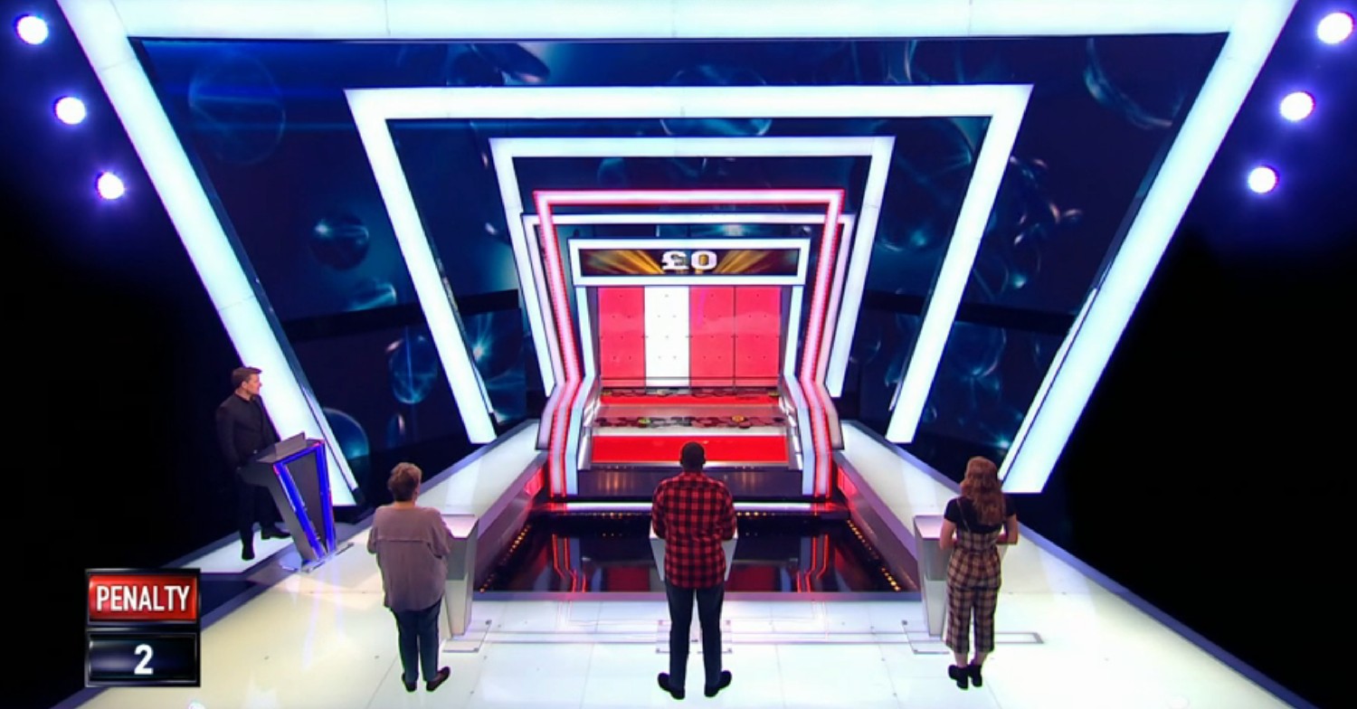 Tipping Point contestants facing the machine
