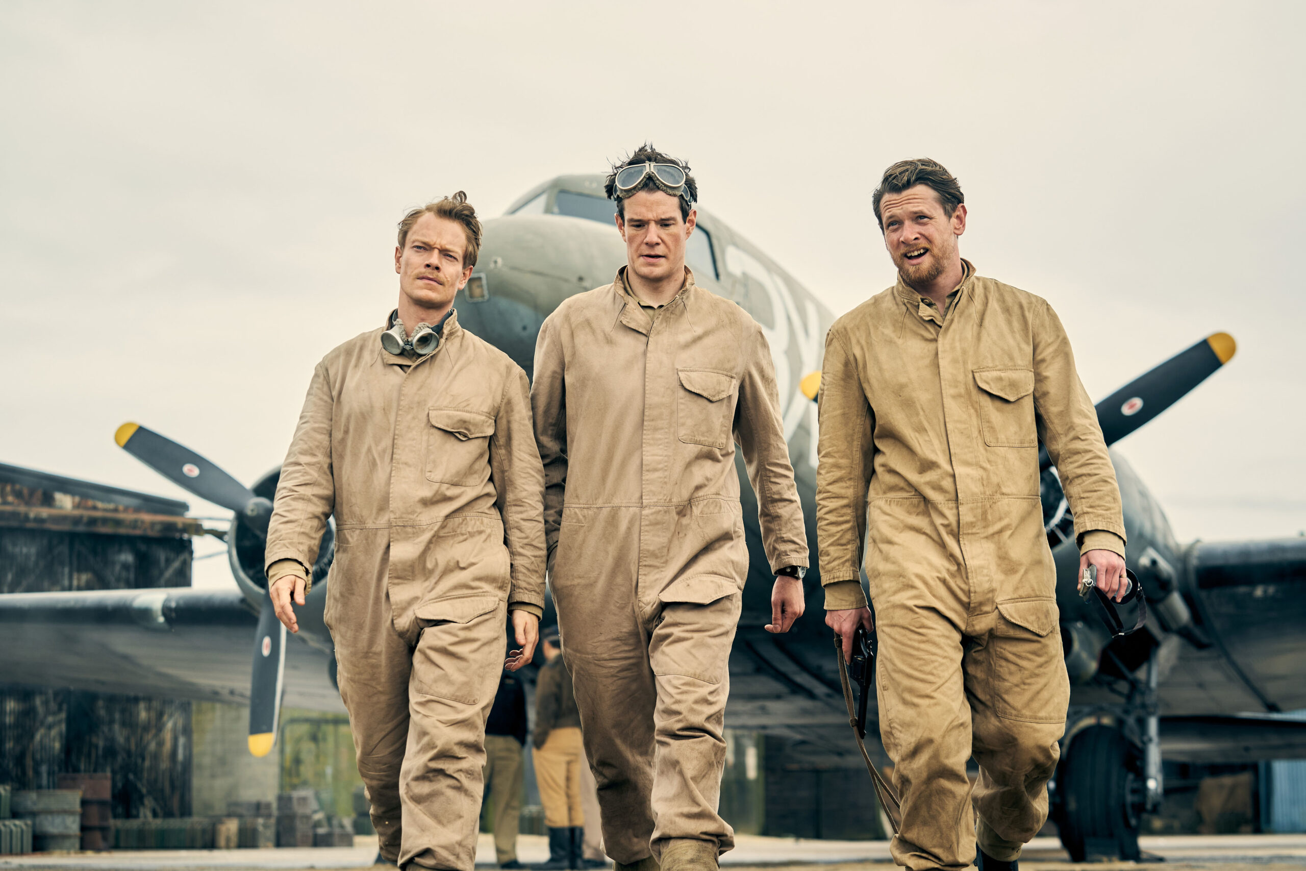 The founders of the SAS standing in front of a plane in SAS Rogue Heroes