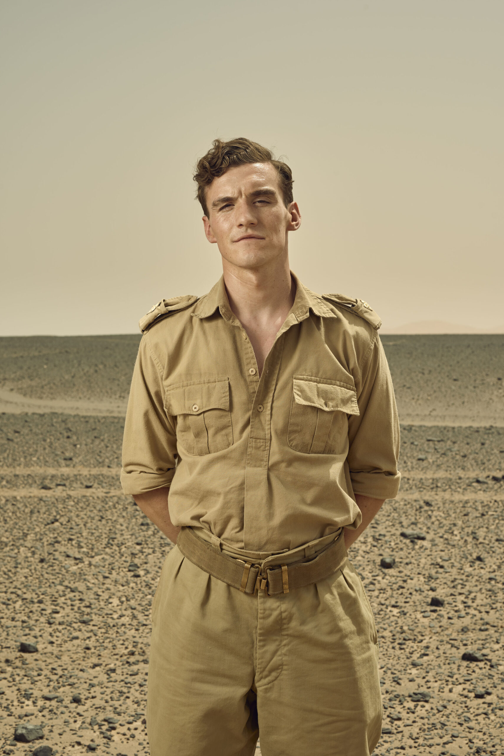 Donal Finn posing in the desert in SAS Rogue Heroes