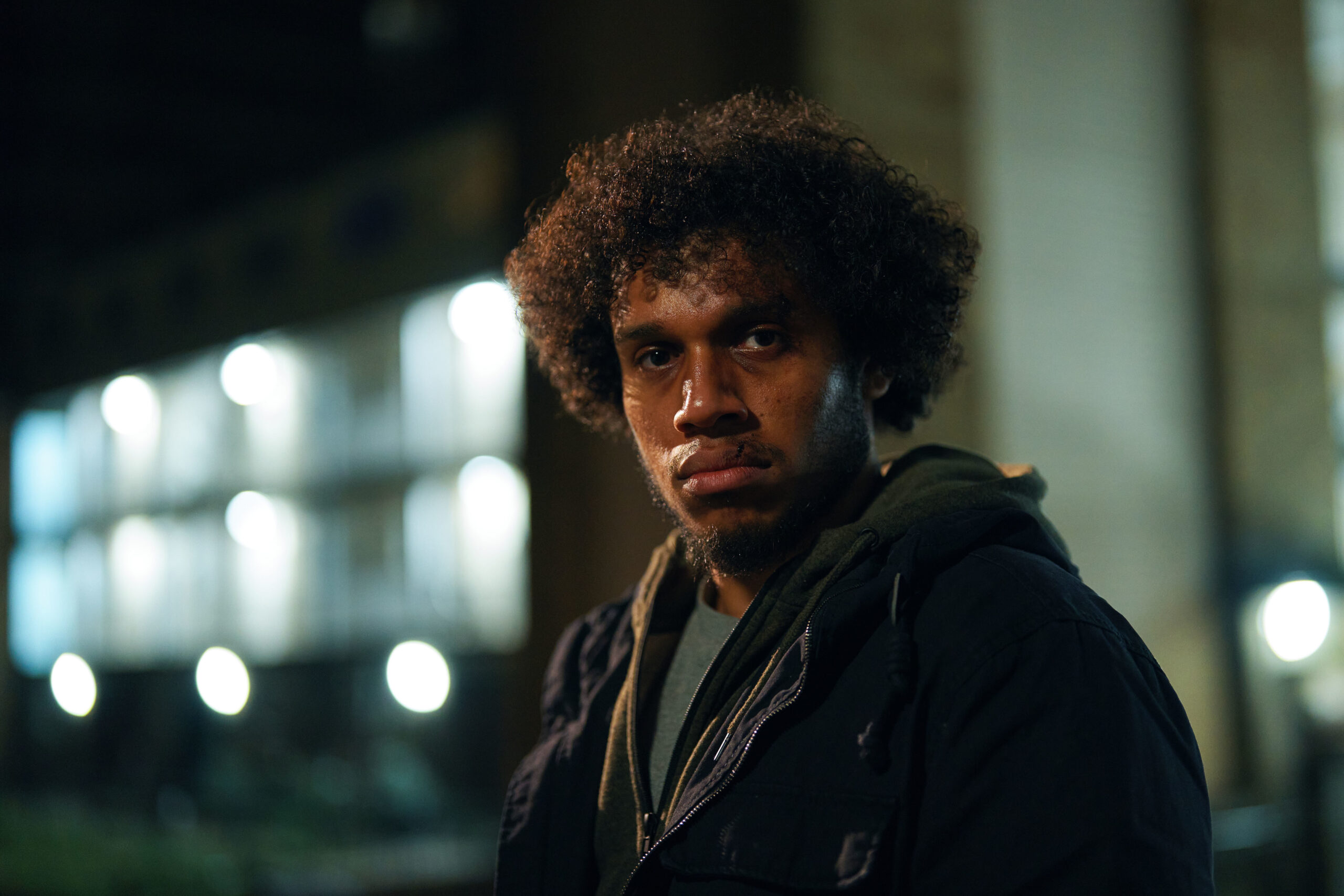 Jordan Wilks as Connor, staring into camera and looking menacing