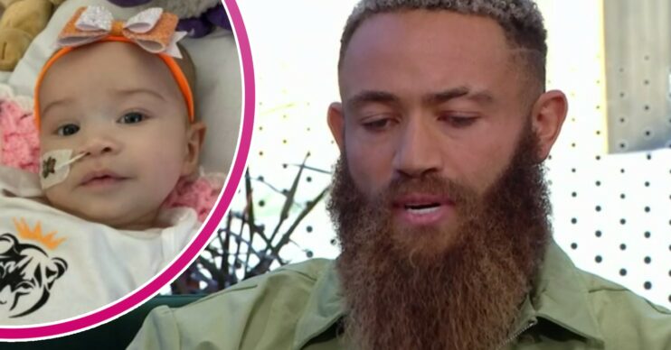 Ashley Cain looks downwards
