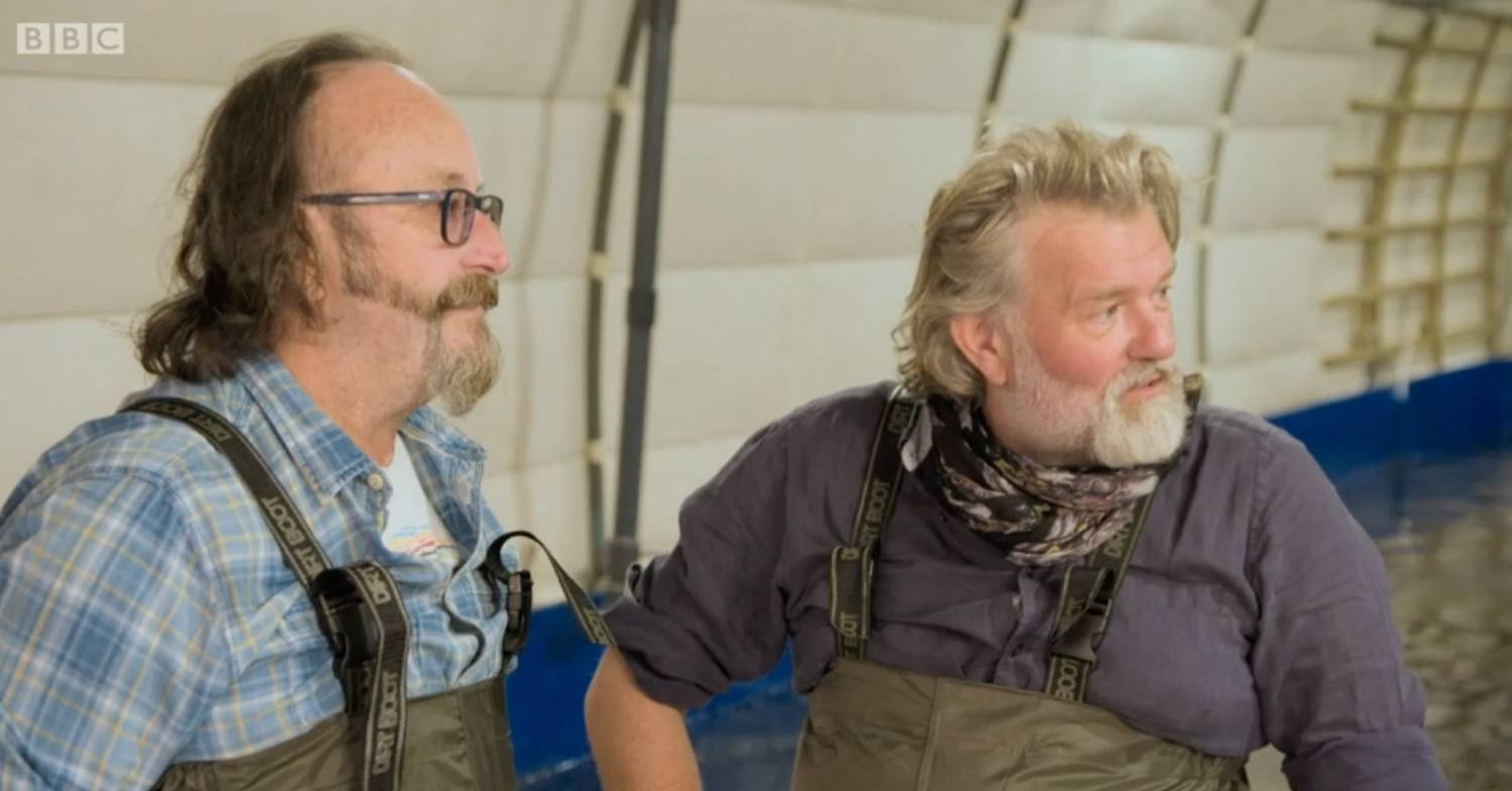 Dave Myers listens with TV partner Si King