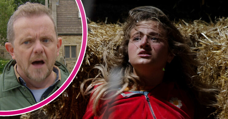 Emmerdale Dan looking concerned and Amelia in pain in the barn