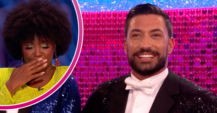 Motsi Mabuse looking shocked and Giovanni smiling