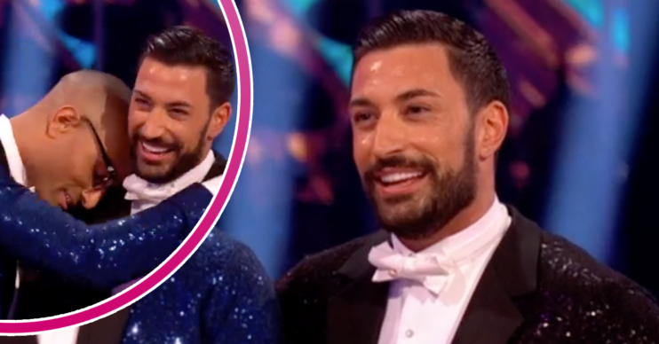 Giovanni Pernice smiling and cuddling Richie