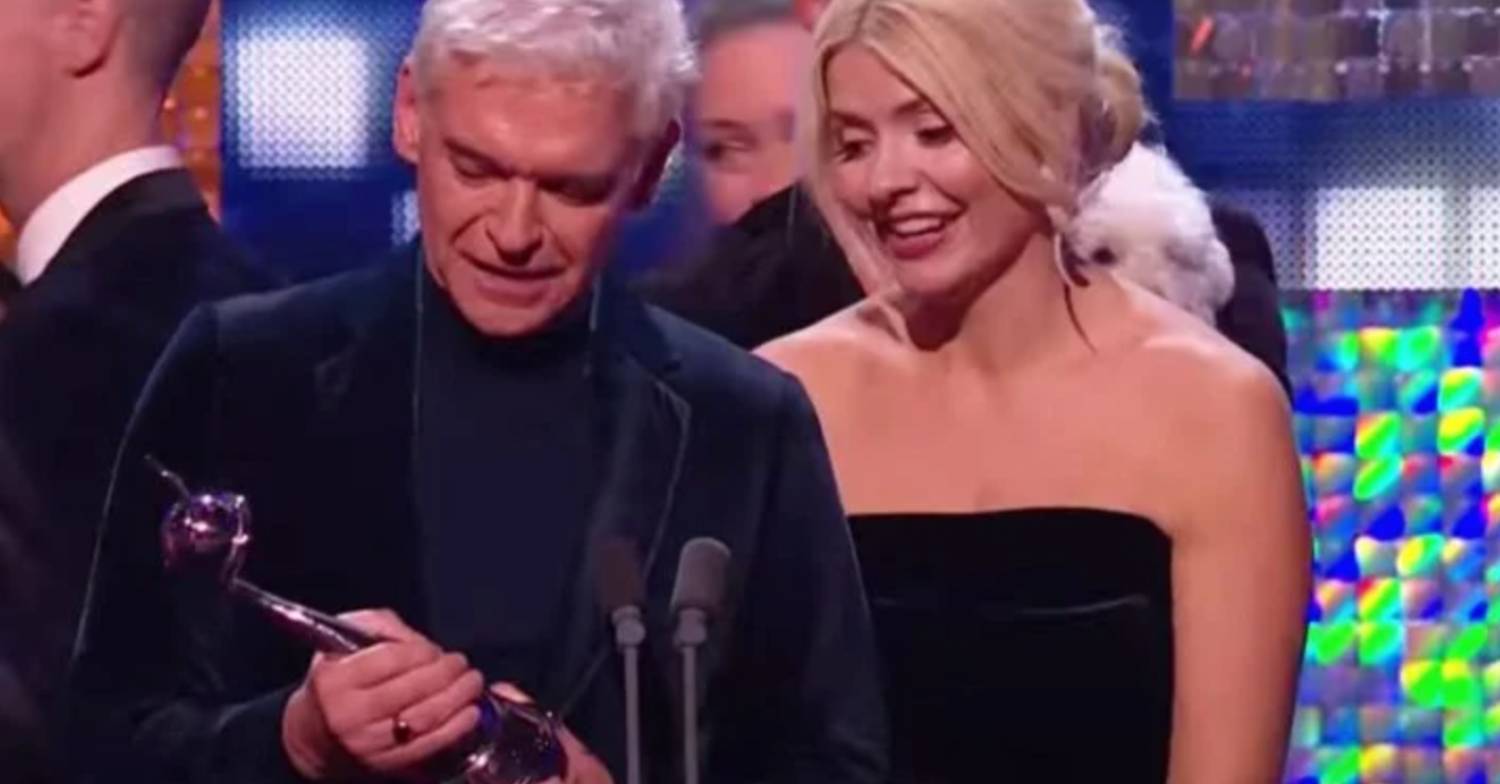 Phillip Schofield and Holly Willoughby look at NTAs award