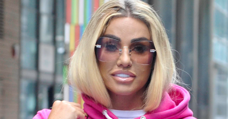 Katie Price wearing sunglasses and a pink top