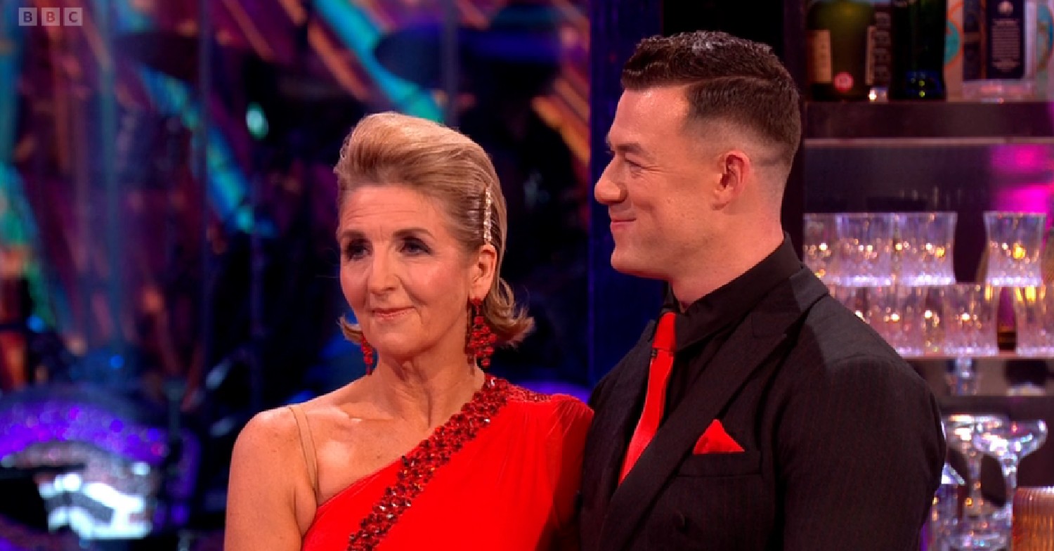 Kaye Adams smiling on Strictly alongside Kai Widdrington