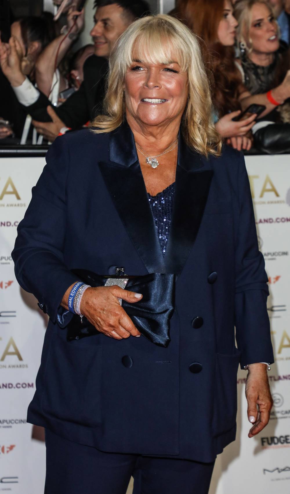 Linda Robson poses on the NTAs red carpet