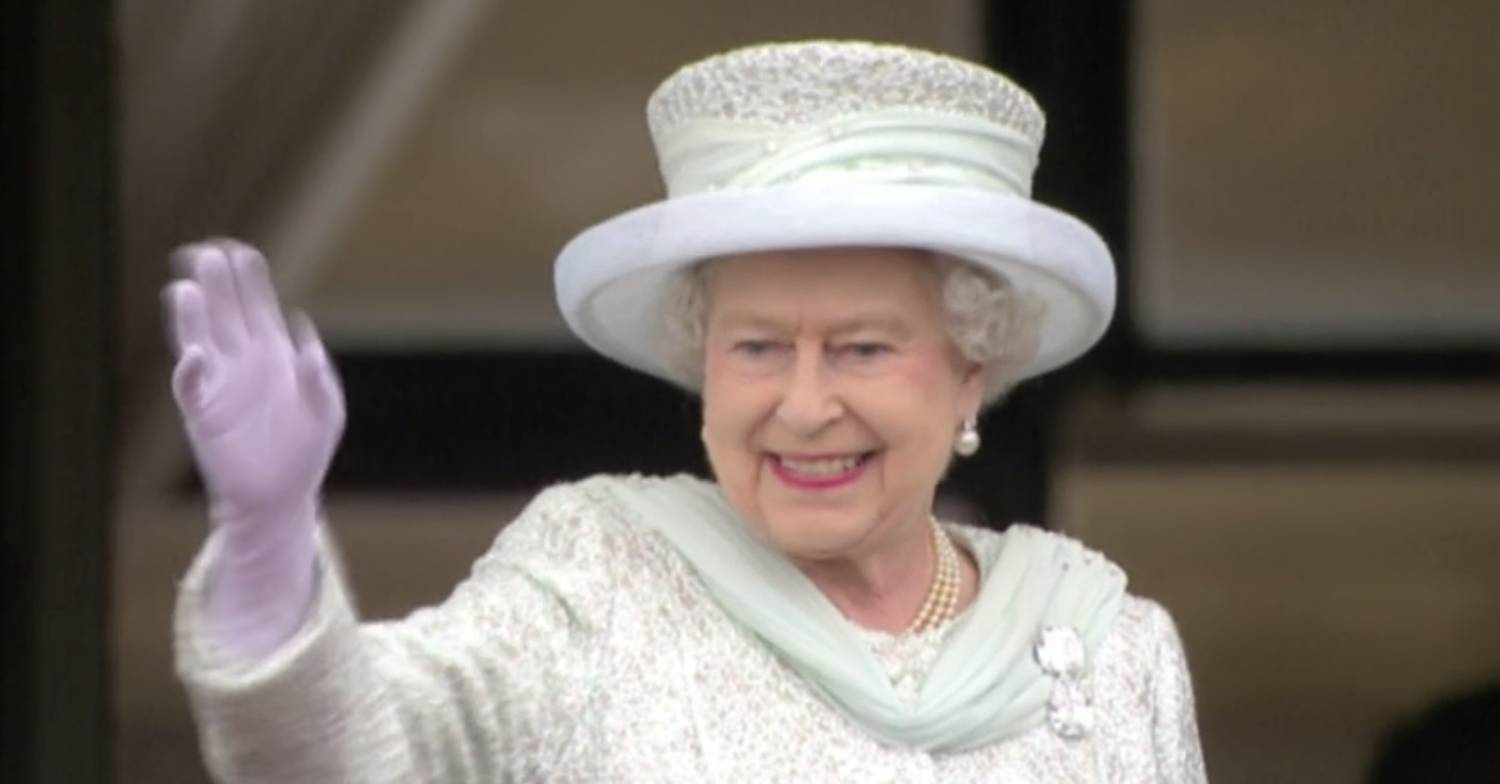 The Queen waves